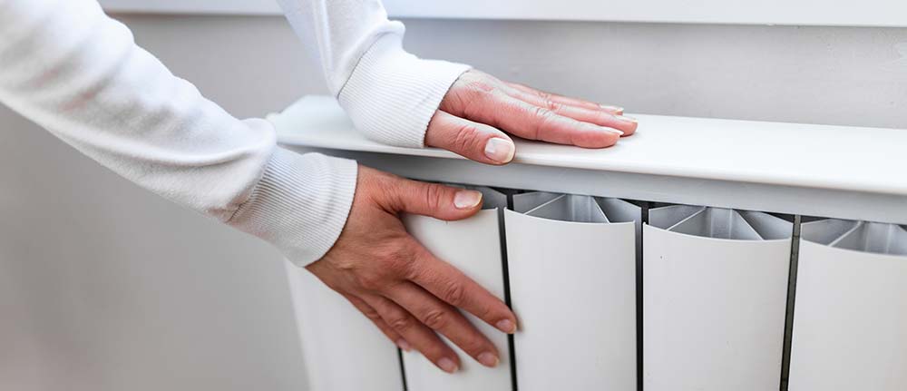 Hands on radiator